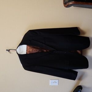 Black pin stripes mens suits.